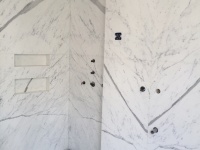 Fabrication et pose d'une salle de bains en marbre blanc statuaire qualité extra à Paris